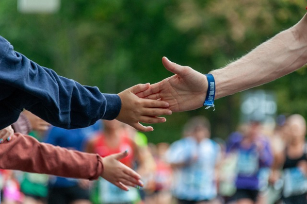 Two people shaking hands, with another person reaching out with no hand to shake. Image by alba1970 from Pixabay.&nbsp;