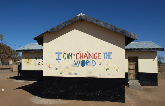 Picture of a school in Africa with the words written on the building: I can change the world.&nbsp;Image by henkpijper from Pixabay.&nbsp;