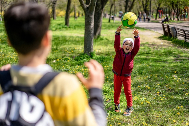 Child in a park, catching a ball.&nbsp;Image by Oleksandr Pidvalnyi from Pixabay.&nbsp;